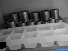 File:Ice spike growing in ice cube tray in refrigerator.ogv